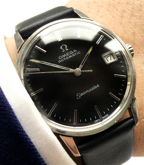 omega seamaster black dial.